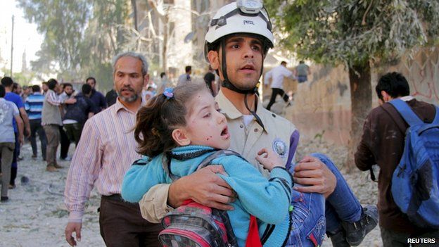Child rescued from alleged barrel bomb attack in Aleppo. 3 May 2015