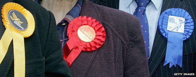 Lib Dem, Labour and Conservative rosettes