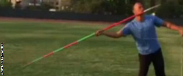 With Clay holding the string, attached to the Javelin, he throws into the distance