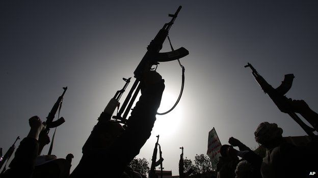Houthi rebels brandish weapons