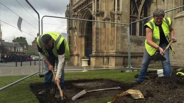 Workmen outside Gloucester Cathedral