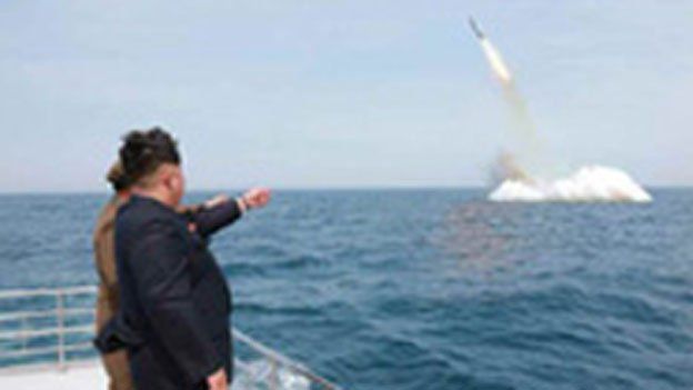 Kim Jong-un oversees a missile launch