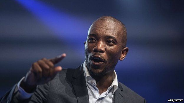 Mmusi Maimane, the newly elected leader of South Africa's main opposition party, gestures as he gives his maiden speech following his election in Port Elizabeth, South Africa, on 10 May 2015.