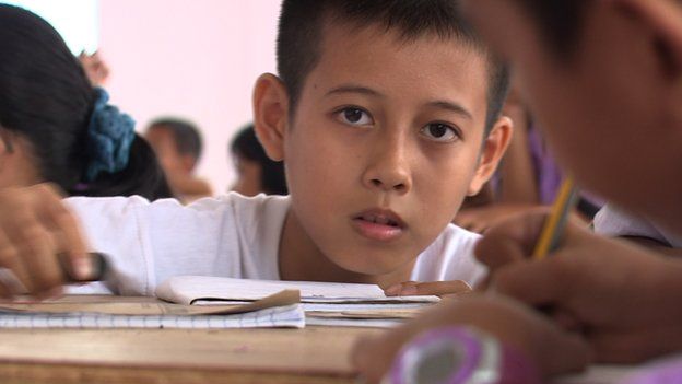 Mark Devilleres, aged 12, son of an immigrant in Malaysia