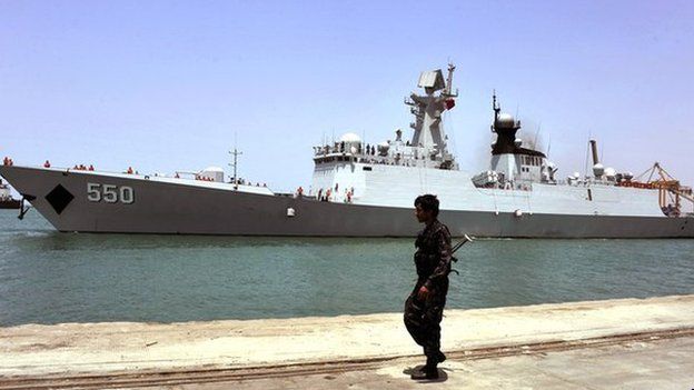 A Yemeni soldier keeps watch on the Chinese frigate, the Weifang, during an evacuation of Chinese people from Yemen in the western port city of Hodeidah, Yemen, on 30 March 2015