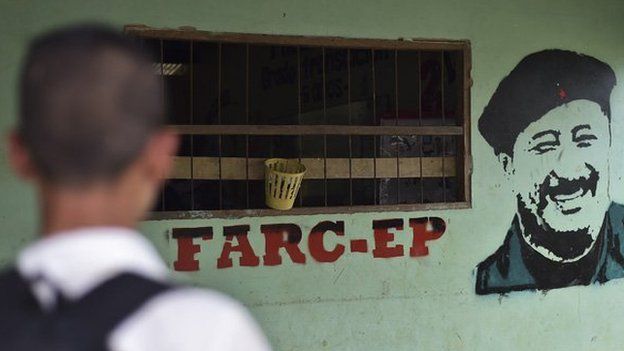 The image of late Farc commander Mono Jojoy can be seen painted on a wall of the school of Puerto Amor on 3 November, 2014.