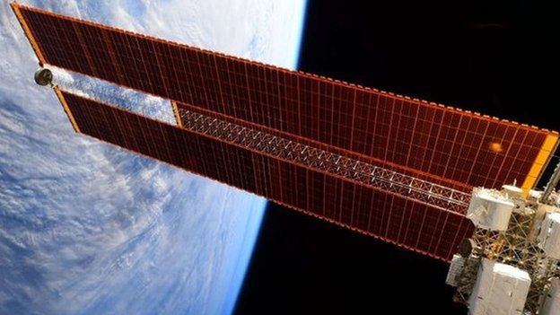Image released April 14, 2015 by ESA/NASA shows the giant solar arrays on the International Space Station photographed on February 12, 2015 by Expedition 43 Flight Engineer Samantha Cristoforetti of the European Space Agency (ESA).