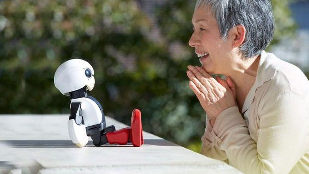 Older woman with robot