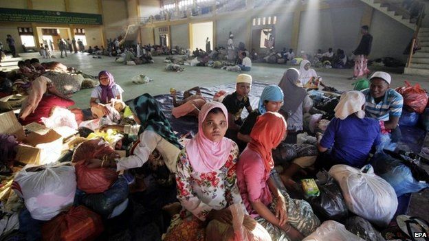 Rohingya refugees get some rest at Lhok Sukon Stadium, in Lhoksukon, Aceh, Indonesia, 13 May 2015.