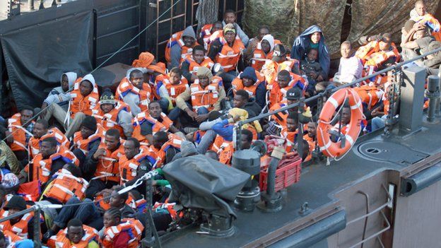 Migrants being taken to HMS Bulwark
