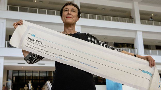 Cornelia Parker with a fragment of Magna Carta (An Embroidery) at the British Library