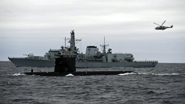 A Swedish Navy submarine (front) participates in Nato's Dynamic Mongoose anti-submarine exercise in the North Sea off the coast of Norway, 4 May 2015.