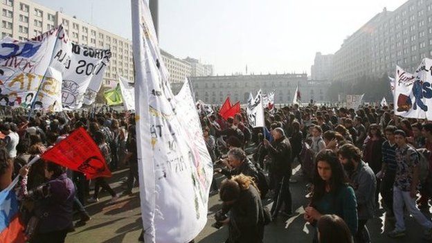 Thousands of demonstrators participate in a rally demanding changes in the education policies supported by President Michelle Bachelet, Chile, 14 May 2015
