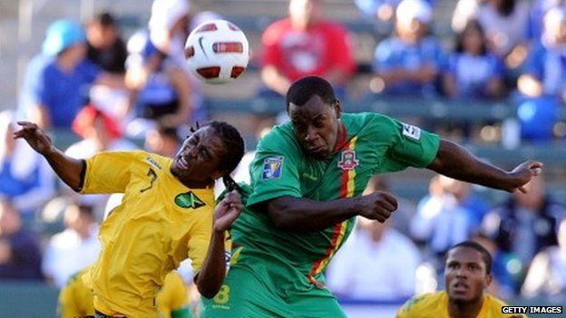 Delroy Facey (green) playing international football in 2011