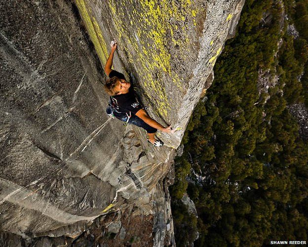 Graham Hunter climbs a cliff