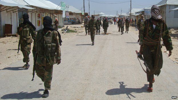 al-Shabab recruits walk down a street 5 March 2012