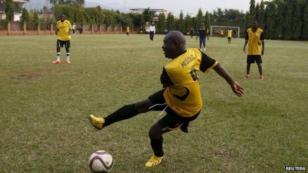 Burundi leader playing football