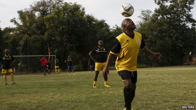 Pierre Nkurunziza playing football