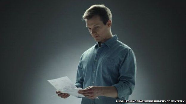 A still from the defence forces shows a reservist receiving a letter