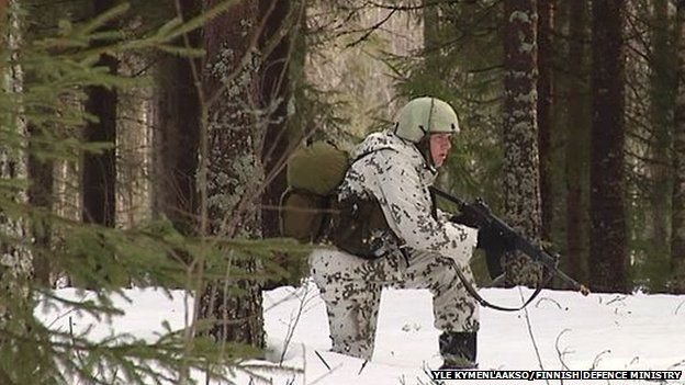 A Finnish army conscript on winter exercises