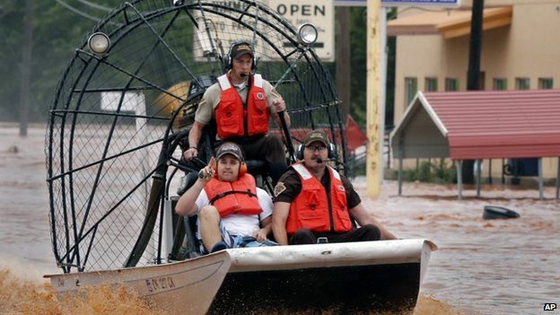Highway patrolmen use air boats for rescues in Purcell, Oklahoma, 24 May