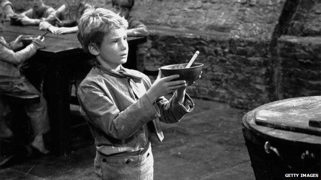 Mark Lester as Oliver Twist asking for some more gruel