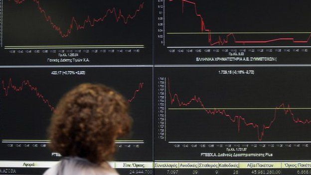 Screens displaying share prices in Greece