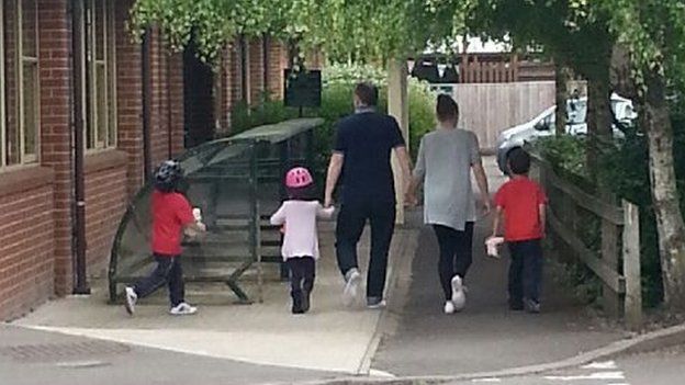 Families arrive at Ladygrove Community Centre