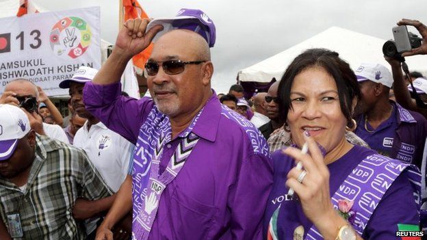 Suriname's President Desi Bouterse and his wife Ingrid after he cast his vote during parliamentary elections on 25 May, 2015