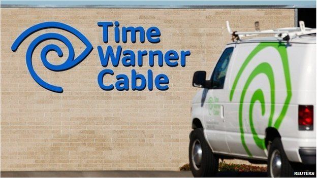 Time Warner sign and van
