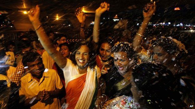 Members of the transgender community celebrate the passage of a bill seeking equal rights for transgenders in the country’s upper house, in Bhubaneswar, India, Friday, April 24, 2015.