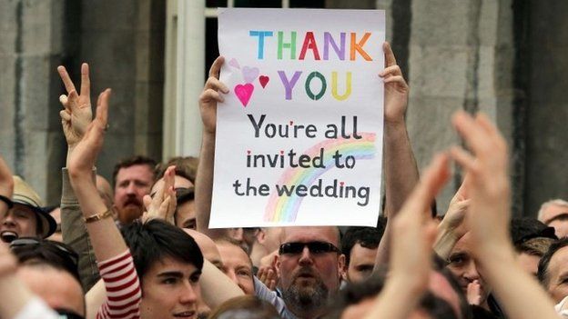A poster which states that "everyone is invited to the wedding"