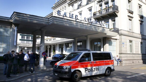 A police van drives past the Baur au Lac hotel in Zurich, Switzerland, 27 May 2015.
