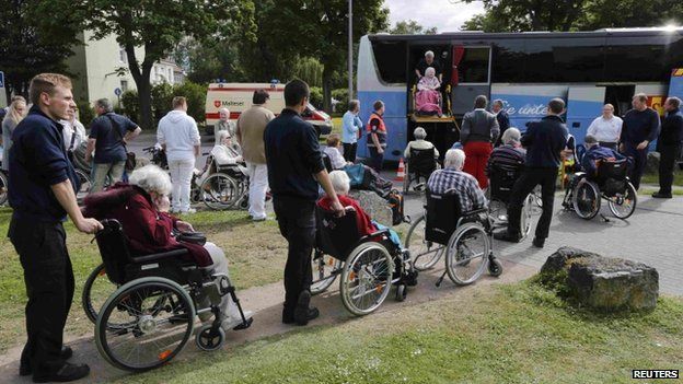 Disabled pensioners being moved to a nursing home