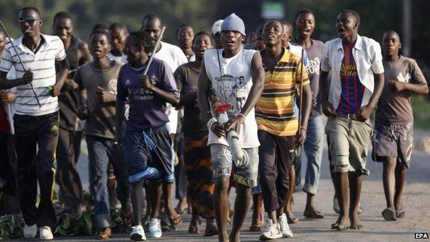Burundian protesters march on the street during an anti-government demonstration against President Pierre Nkurunziza's bid for a third term in the Cibitoke neighbourhood of the capital Bujumbura, Burundi, 28 May 2015