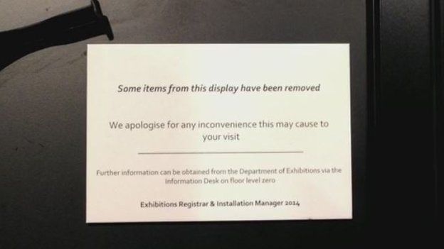 A sign explains that items have been removed from display