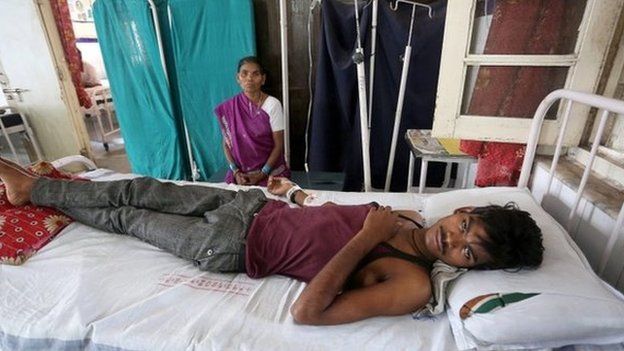 Dhanraj, 17, gets medical treatment in Jai Prakash Narayan hospital after suffering sunstroke and severe dehydration in Bhopal Madhya Pradesh, India, 27 May 2015.