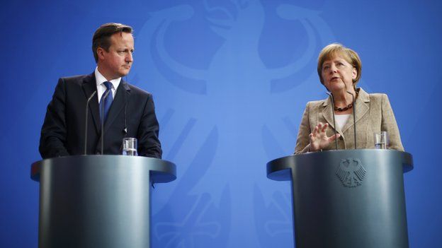 David Cameron and Angela Merkel at a news conference in Berlin