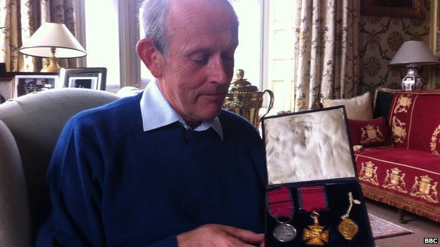 Lord Brookeborough displays the medals of his relative Col Francis Brooke