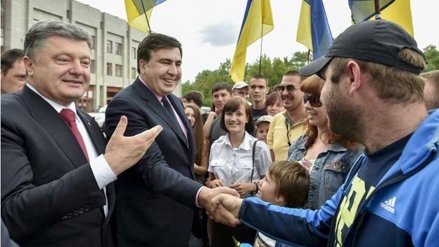 Ukrainian President Petro Poroshenko (left) presents Mikheil Saakashvili (centre) as new Odessa governor. Photo: 30 May 2015