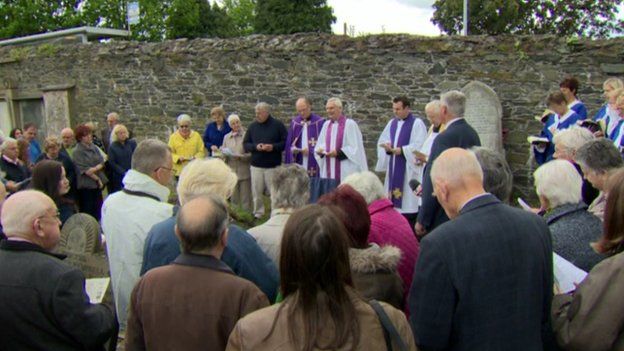 The funeral service was held in the grounds of Bangor Abbey