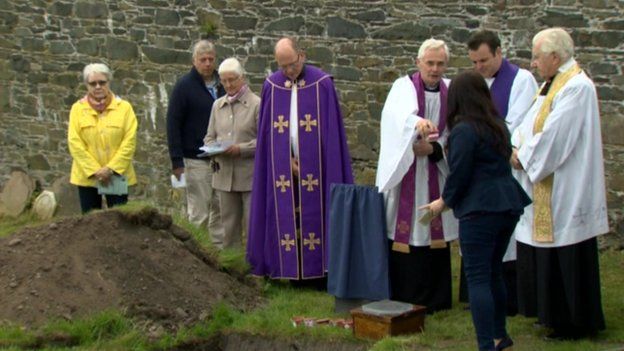 The reburial service was open to the public
