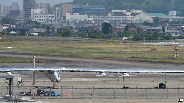 The Solar Impulse 2 solar-powered airplane parked on the apron at the Nagoya airport, Japan (02 June 2015)
