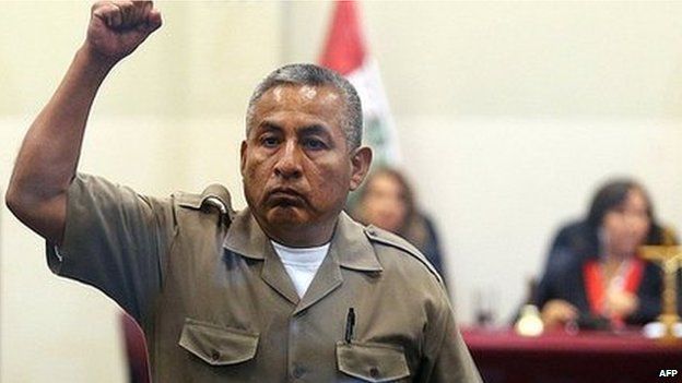 Florindo Flores raises a fist as he is sentenced on 7 June 2013
