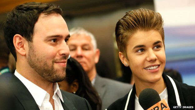 Talent spotter Scooter Braun and Justin Bieber