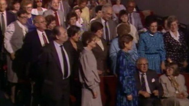 Sir Nicholas Winton (bottom right, sitting down) in 1988 on That's Life when some of the people he rescued were in the audience and surprised him