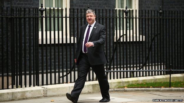 Alistair Carmichael arriving at Downing Street in 2013