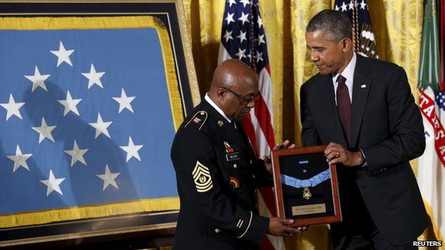 Mr Obama awarding the Medal of Freedom