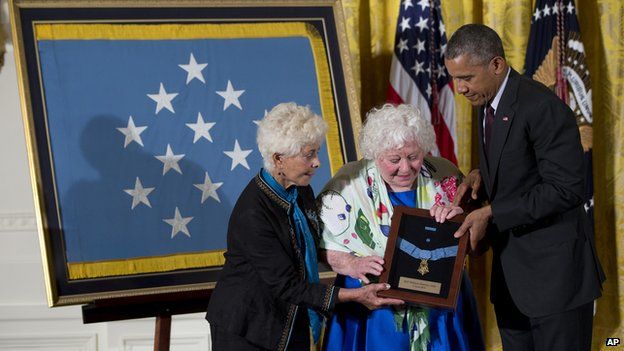 President Obama awarding the medal