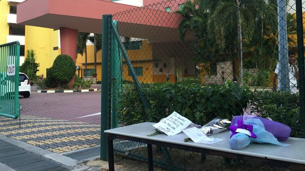 Tributes outside the school in Singapore, mourning the death of a pupil in the Malaysia quake, 6 June 2015